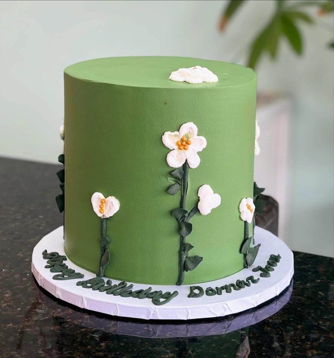 Green Cake With White Floral Stems from Tarzana Bakery