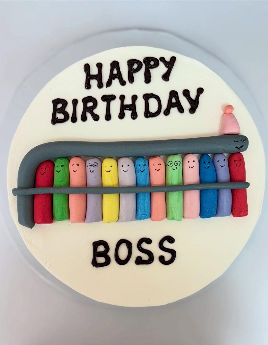 Colorful Smiling Figures Birthday Cake from Tarzana Bakery