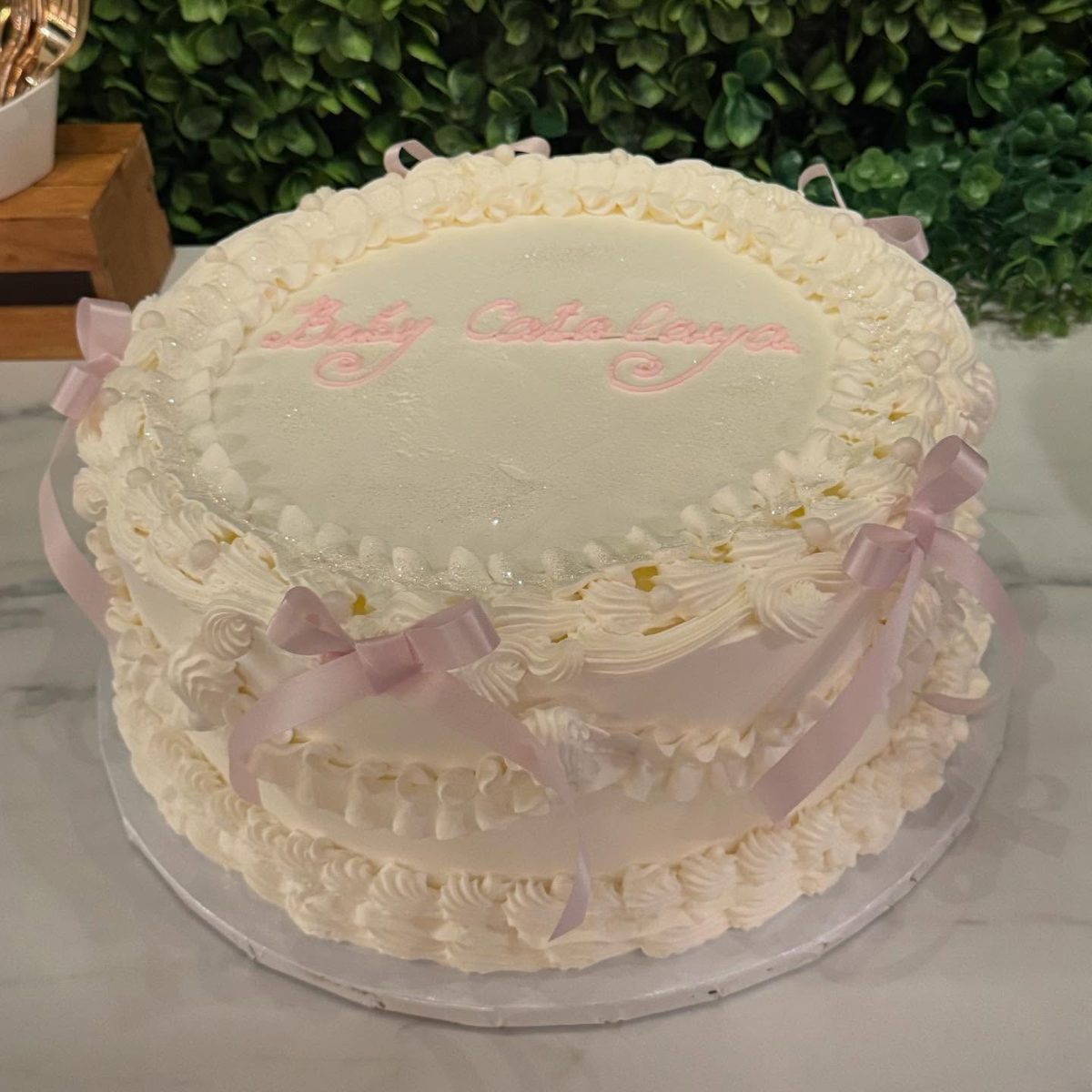 White Piped Cake with Pink Bows from Tarzana Bakery