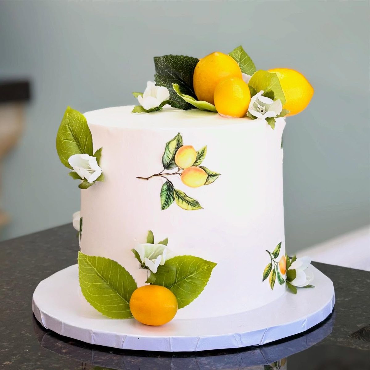 White Cake With Lemon Decorations from Tarzana Bakery