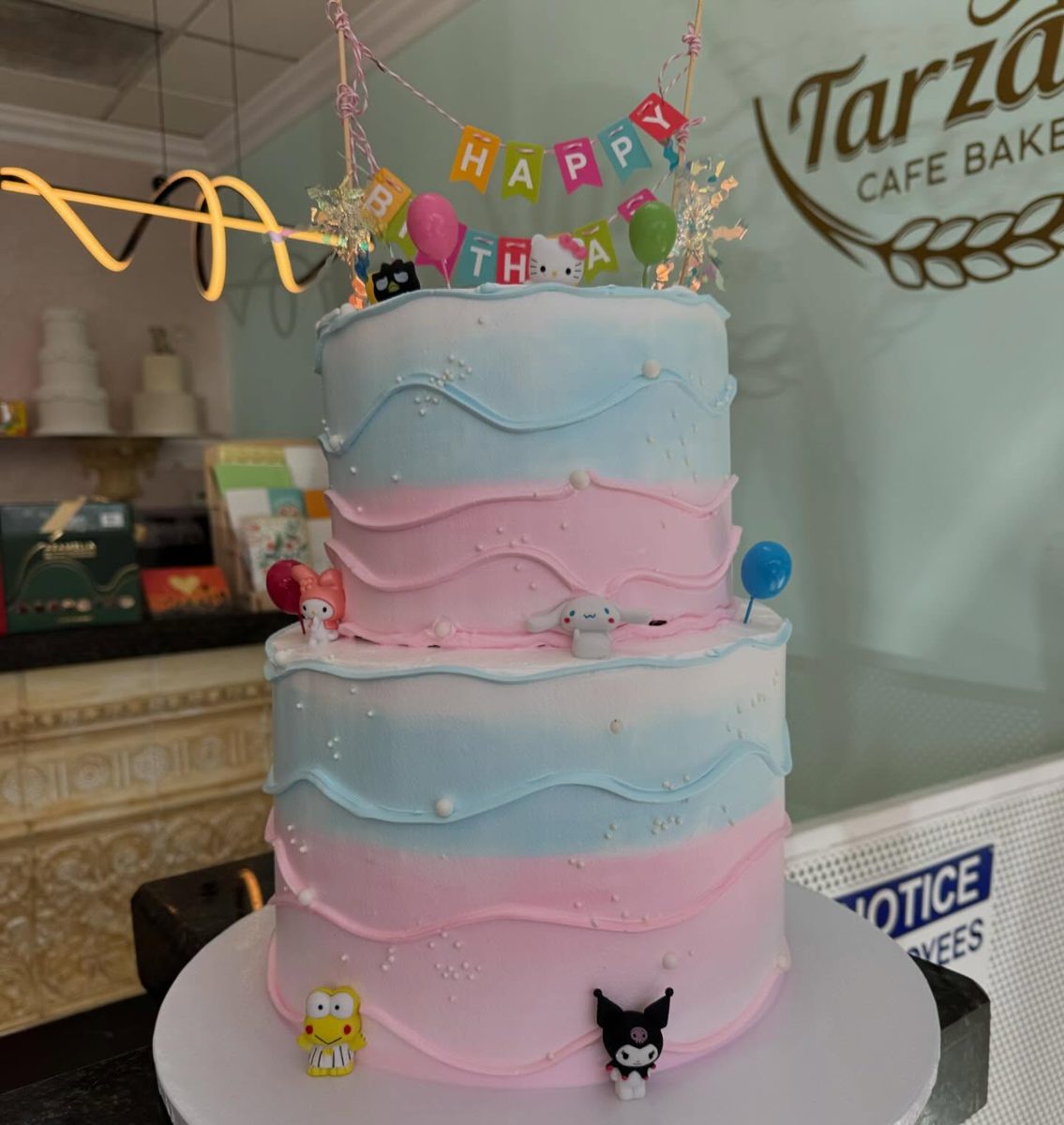 Pastel Tiered Cake With Cartoon Figures from Tarzana Bakery