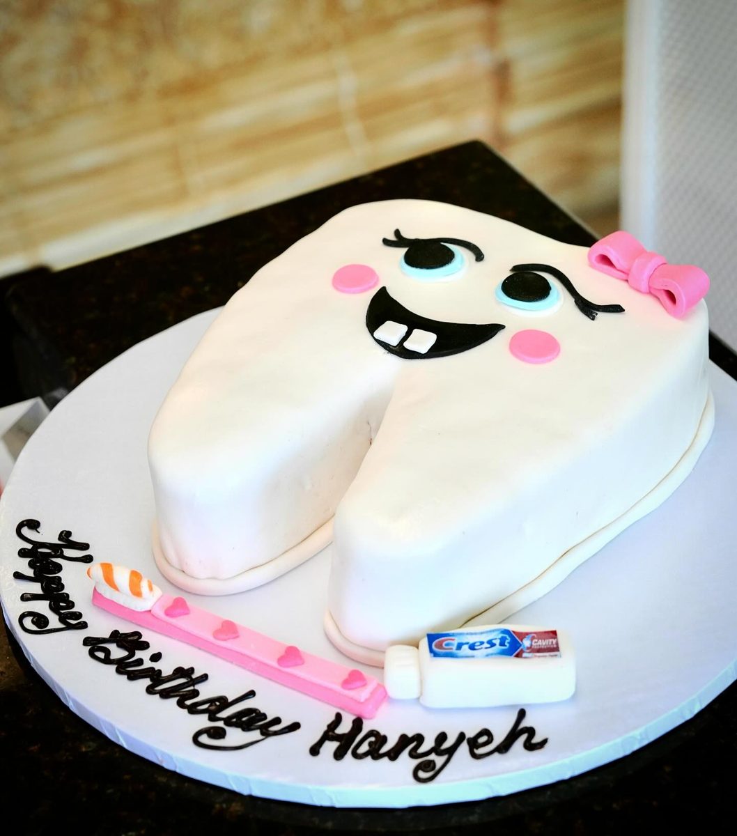 Smiling Tooth Cake With Pink Bow from Tarzana Bakery