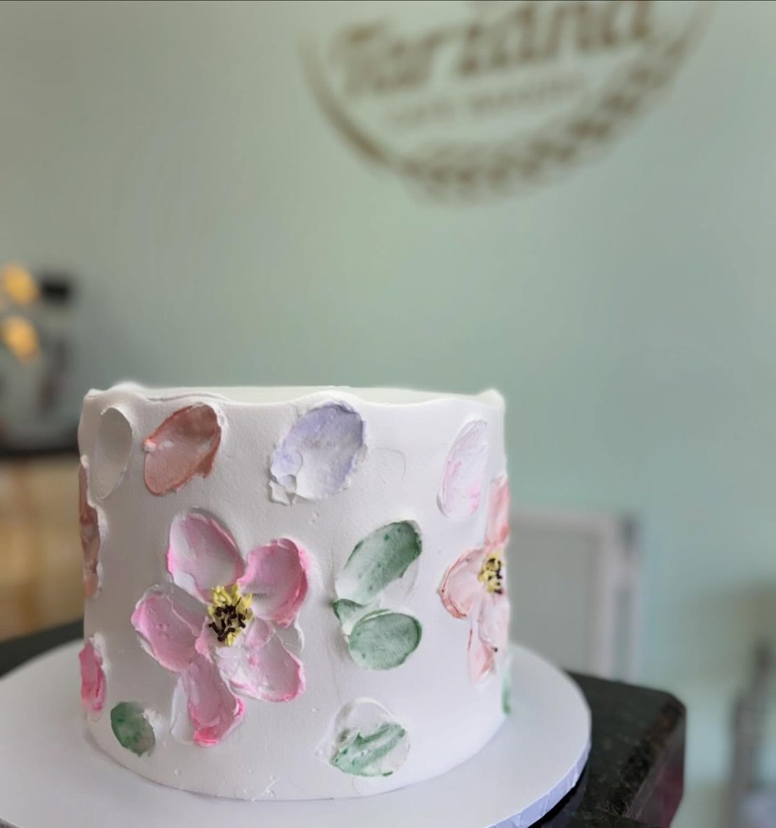 White Cake With Pastel Textured Flowers from Tarzana Bakery