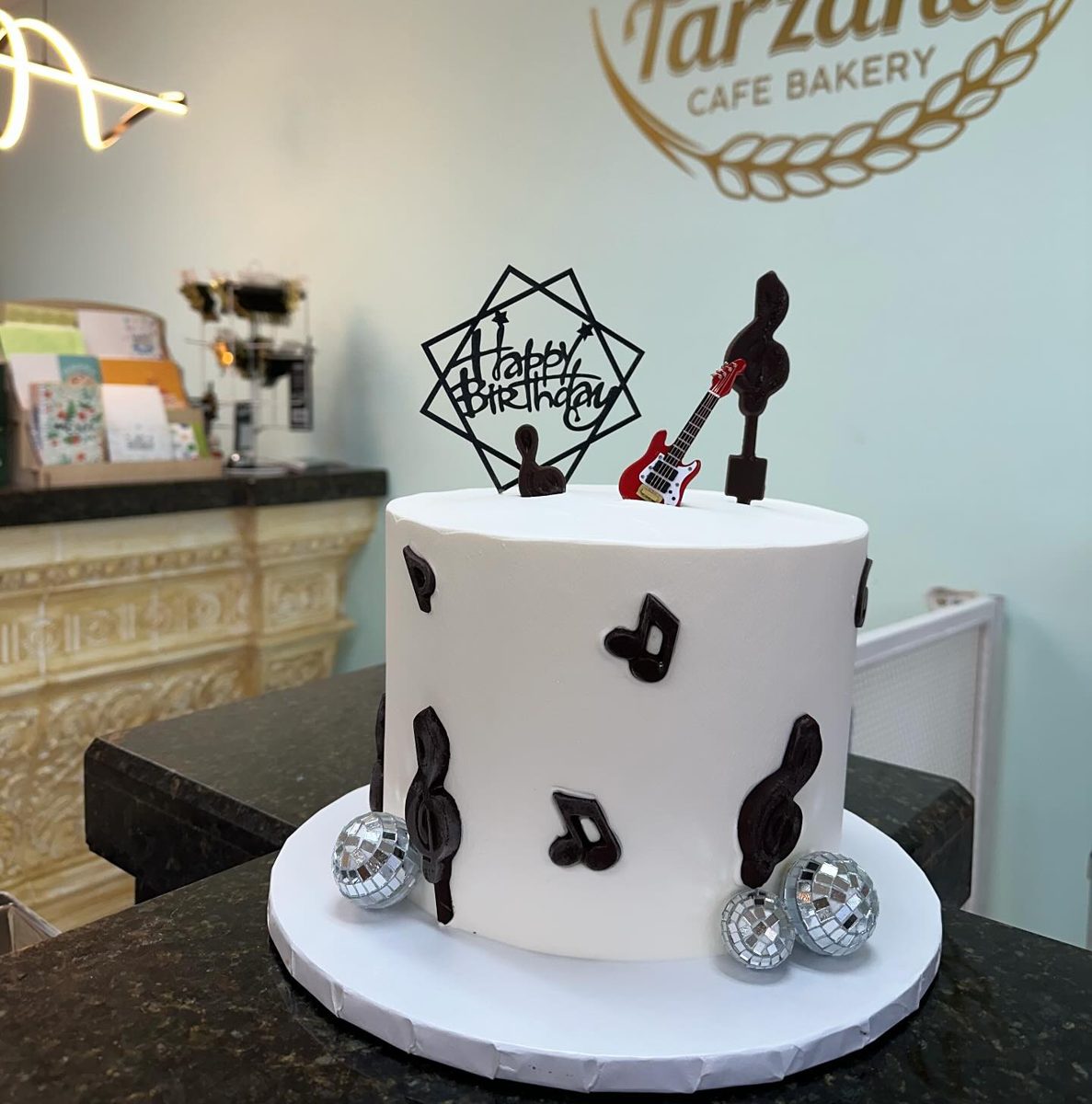 Music Note Cake With Guitar Topper from Tarzana Bakery