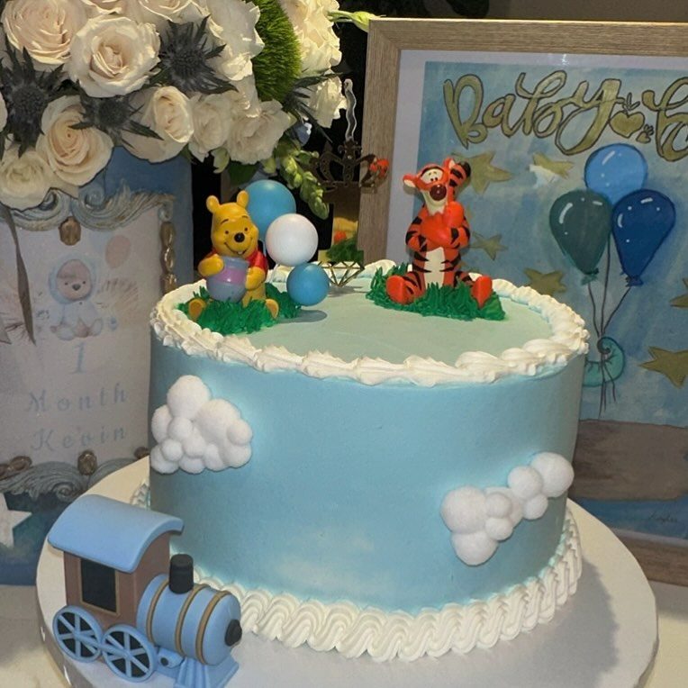 Blue Cloud Cake With Animal Toppers from Tarzana Bakery