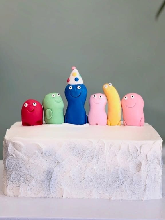 Rectangular Cake With Colorful Smiling Figures from Tarzana Bakery